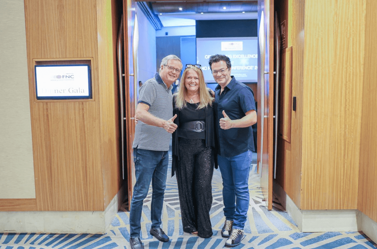 Three FNC business partners together at a networking event